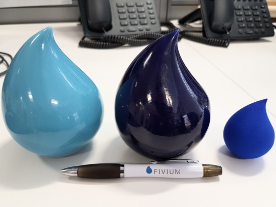Fivium droplet logos in porcelain and plastic